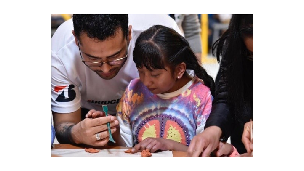 Bridgestone Mexico employee and child